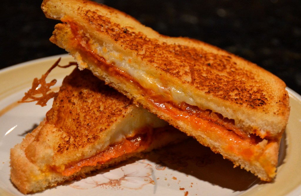 Grilled Pepperoni Pizza Sandwiches. Appreciative Audience Listening To